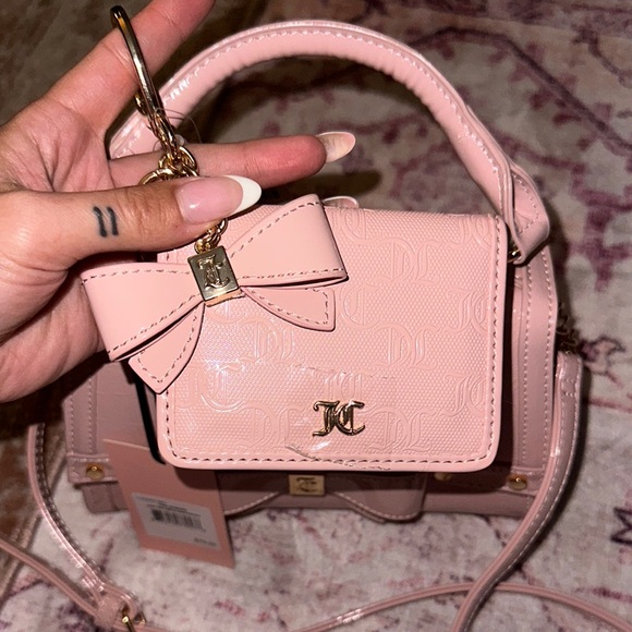 Juicy Couture pink gloss bow handbag